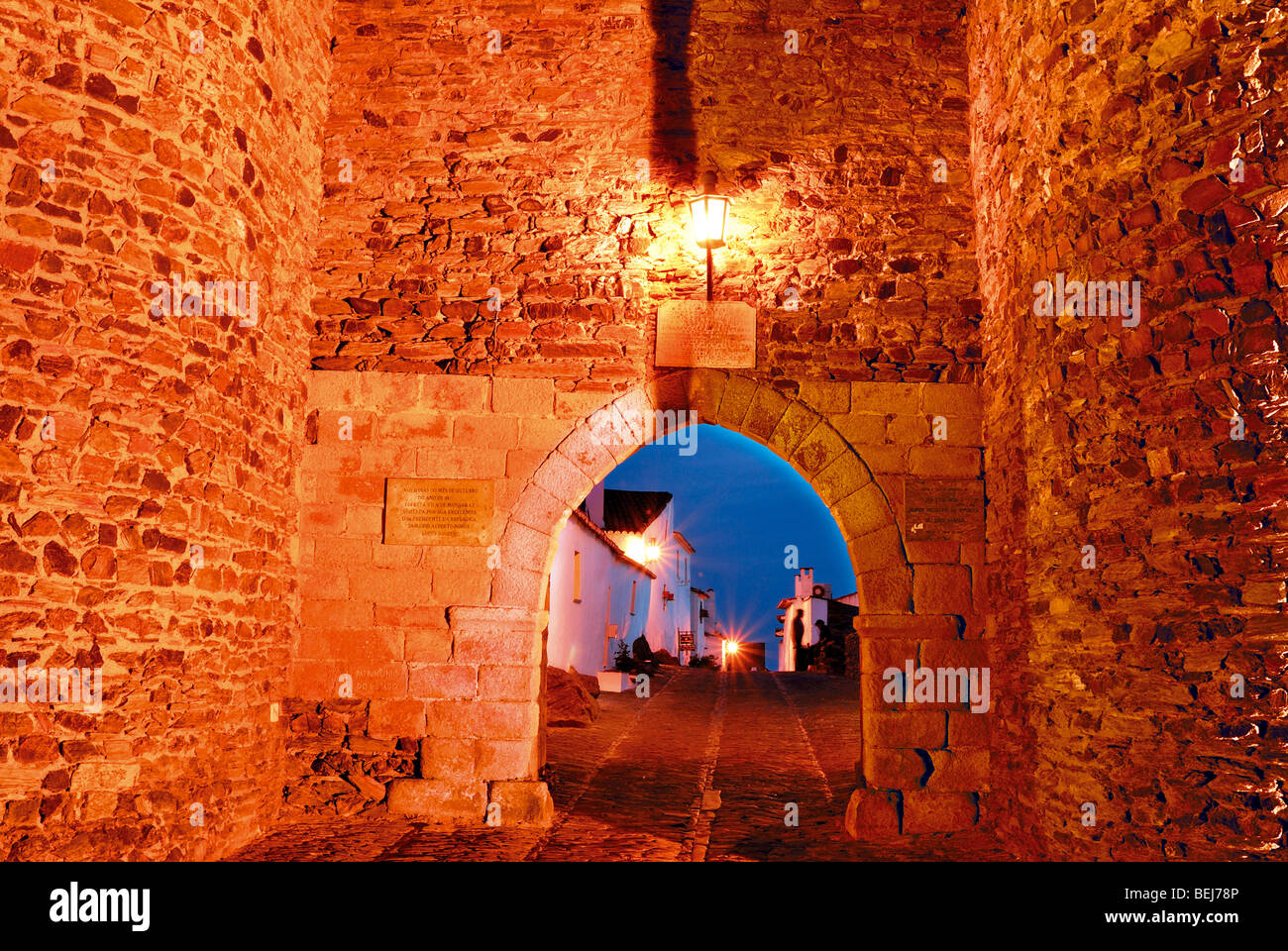 Portugal, Alentejo; Nocturnal view and Medieval town gate of the historical village Monsaraz Stock Photo