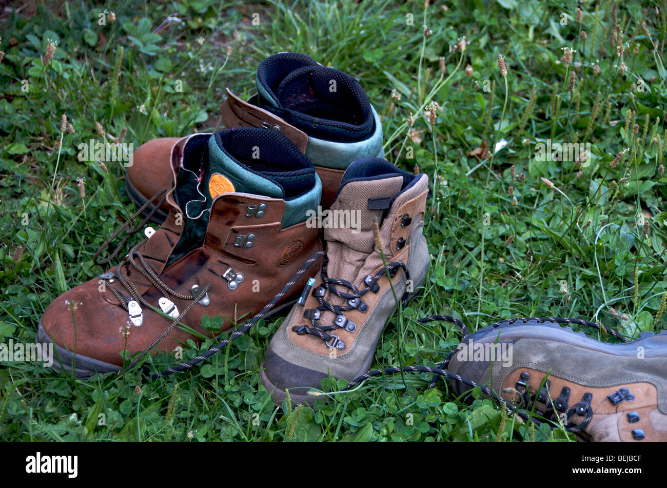 Two pairs of hiking boots put in the grass Stock Photo Alamy