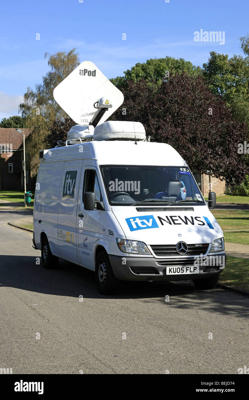 A White ITN News vehicle with a Satellite transmitter on the roof Stock Photo