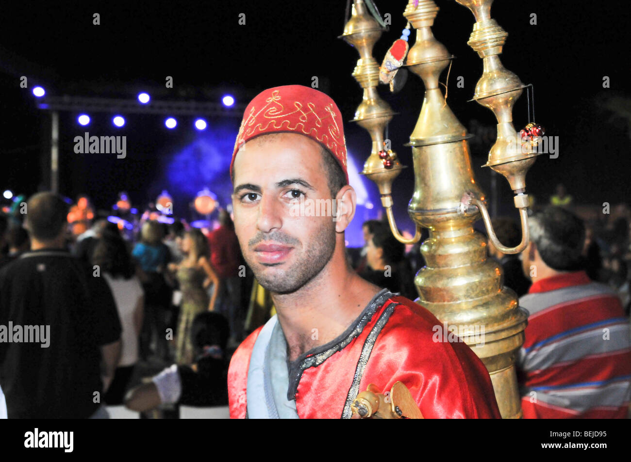 Israel, Acre, Man in traditional clothes sells tamarind juice Stock Photo