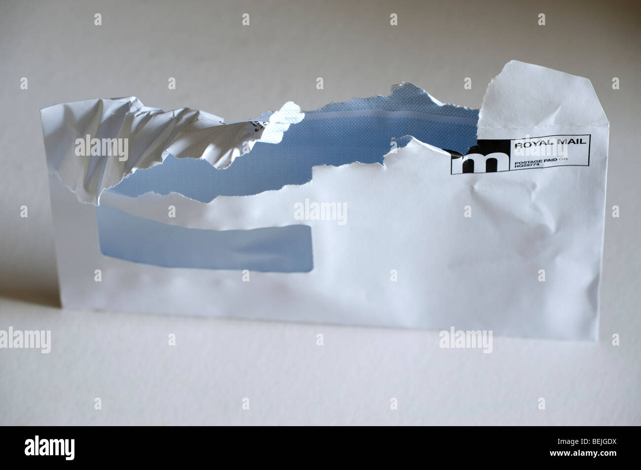 Ripped open "Royal Mail" white envelope Stock Photo Alamy