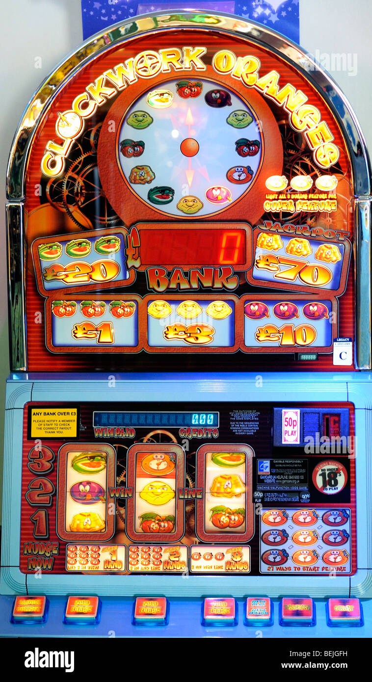 A brightly coloured fruit machine Stock Photo