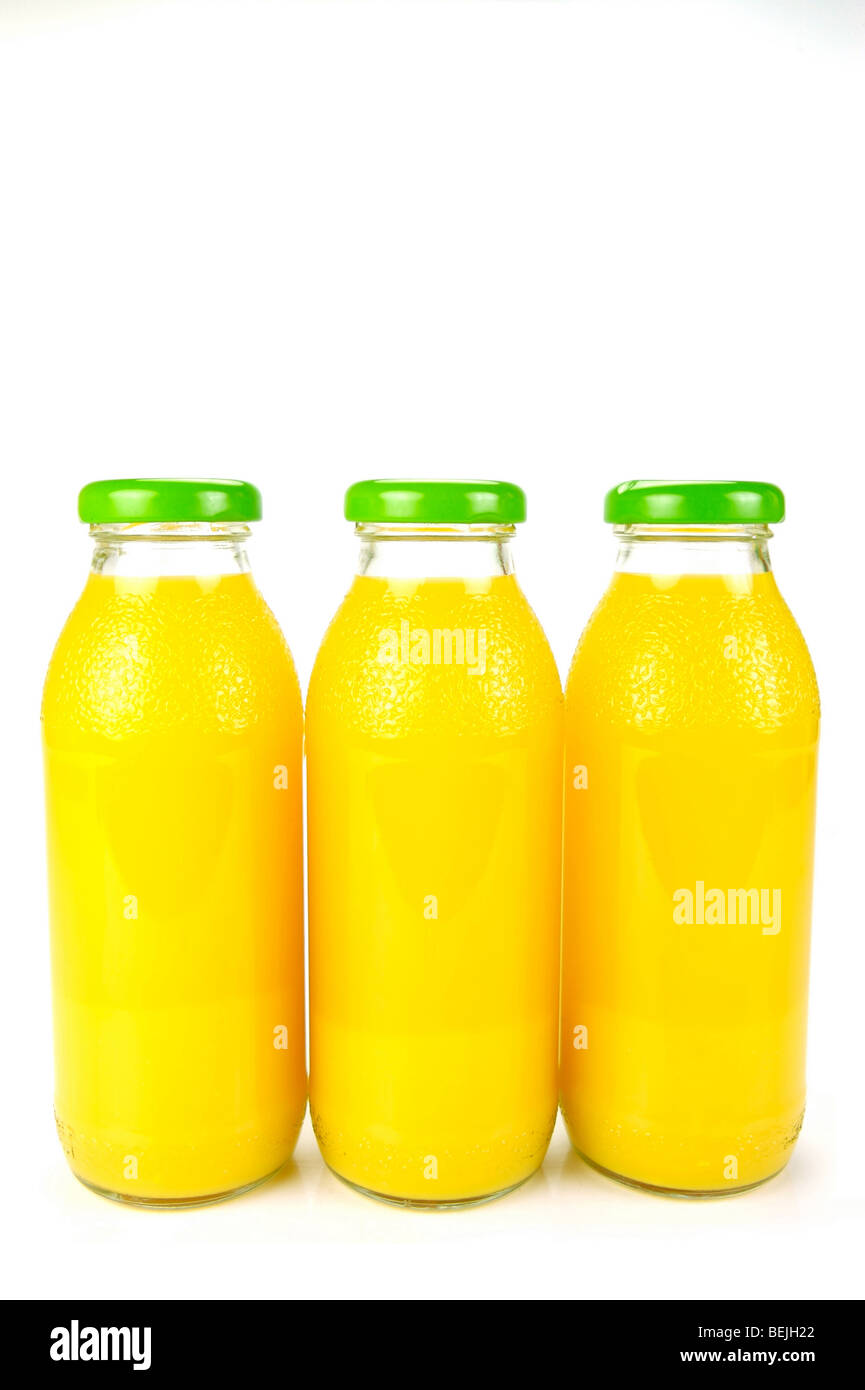 Bottles of orange juice isolated against a white background Stock Photo