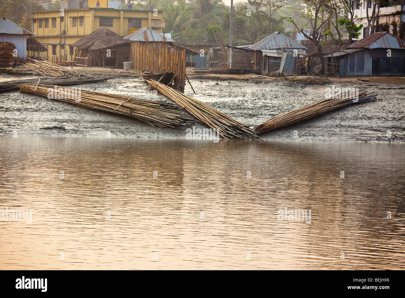 Seen from the Rocket: Bamboo waiting for transport on the Brahmaputra river in Bangladesh Stock Photo