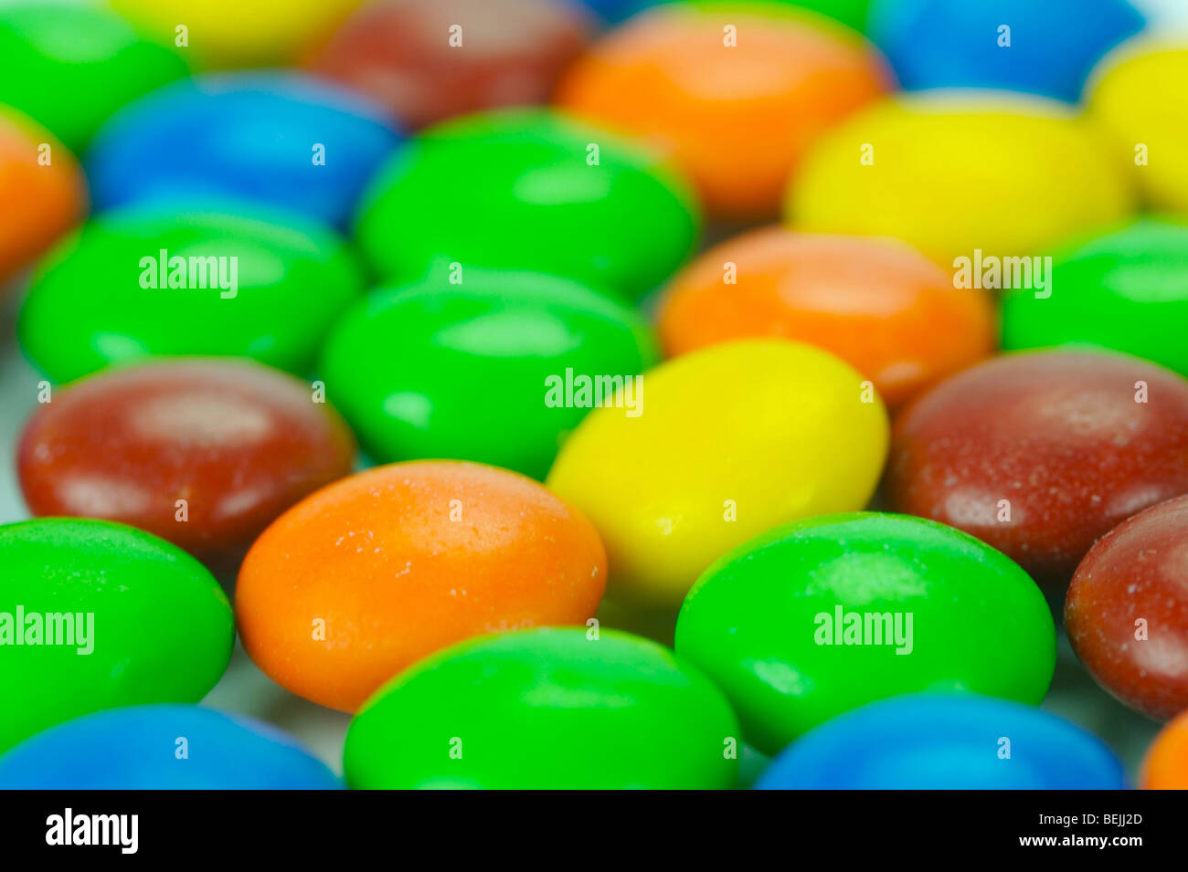 Chocolate coated candy isolated against a white background Stock Photo ...