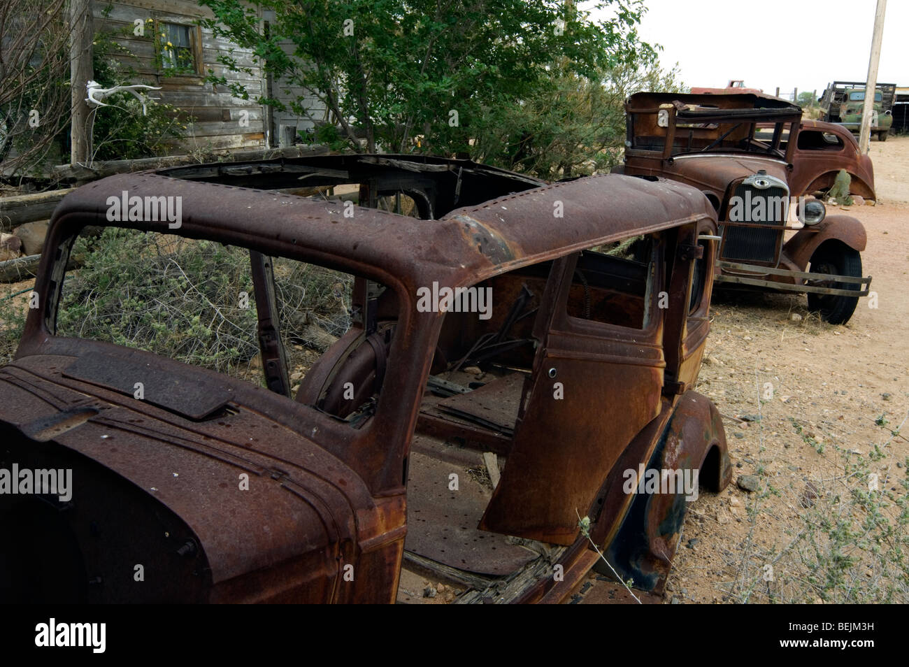 Old rusty vintage cars along the Route 66 at the general store of the