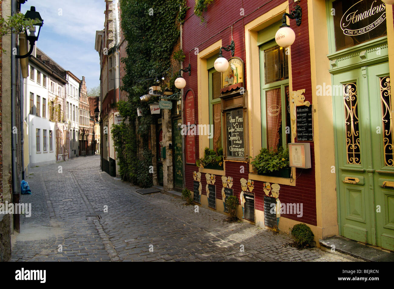 Alley with restaurants in the Patershol, Ghent, Belgium Stock Photo