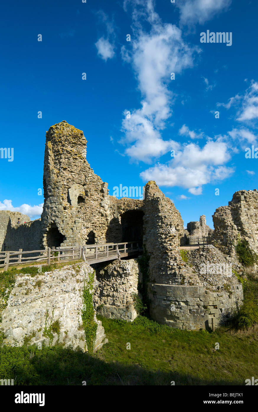 Ruins of Pevensey Castle built within the remaining walls of a Roman fort in Sussex UK near to where the Norman invasion began. Stock Photo