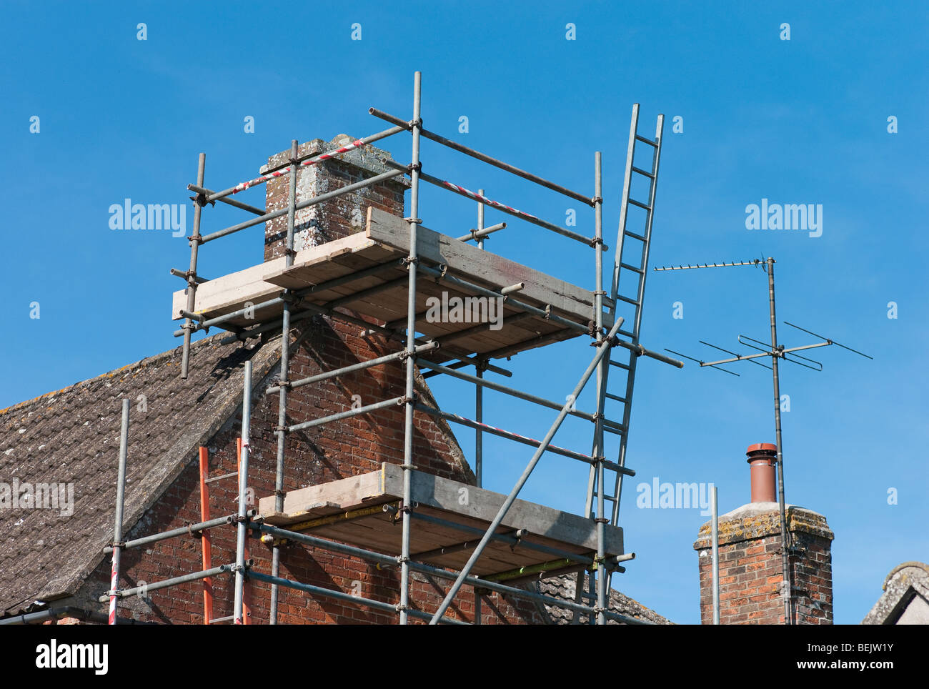 Ladder On Chimney High Resolution Stock Photography and Images - Alamy