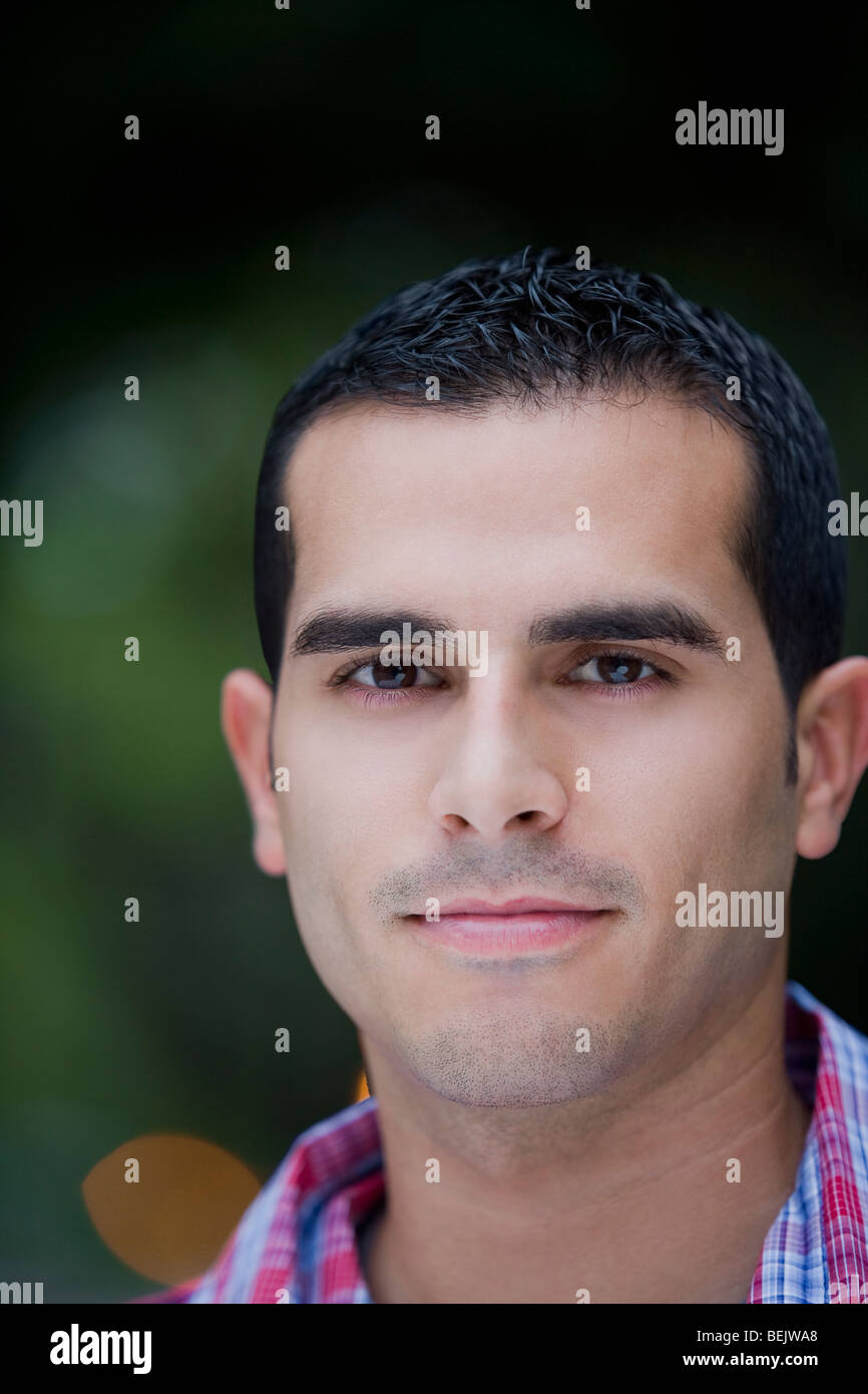 Portrait of a young man smiling Stock Photo - Alamy