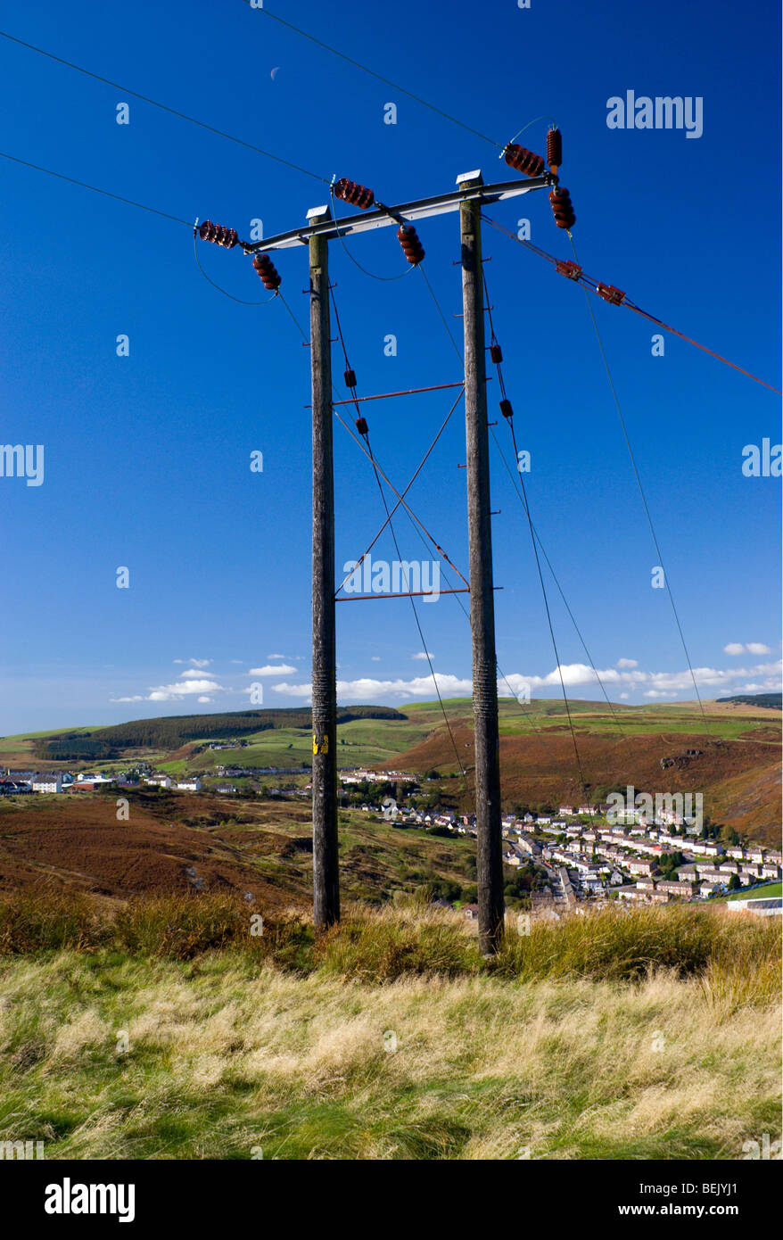 power lines on mynydd y glyn above porth in the rhondda valley south wales uk Stock Photo