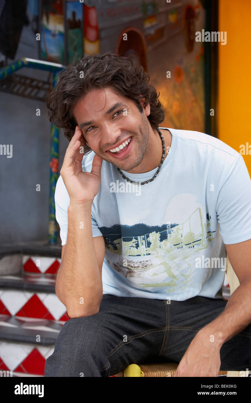 Portrait of a young man smiling Stock Photo - Alamy