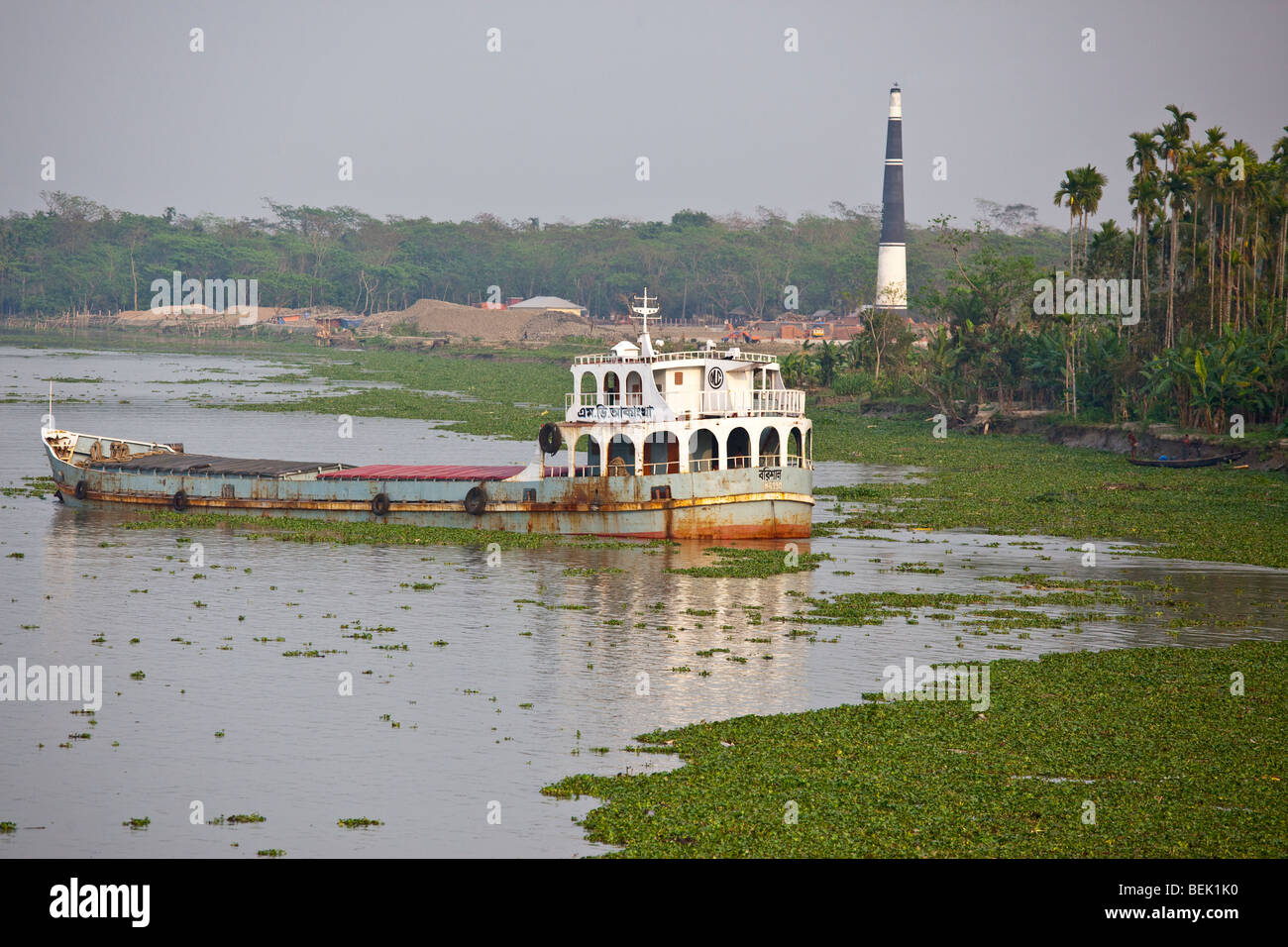 Seen from the Rocket: Ship and Brick Factory on the Brahmaputra River in Bangladesh Stock Photo