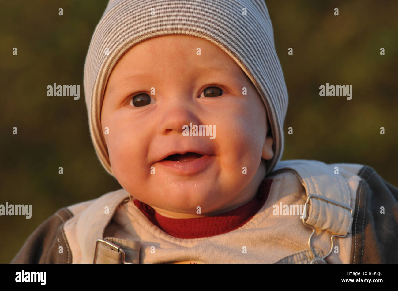 Happy 6 month old baby boy smiling Stock Photo Alamy
