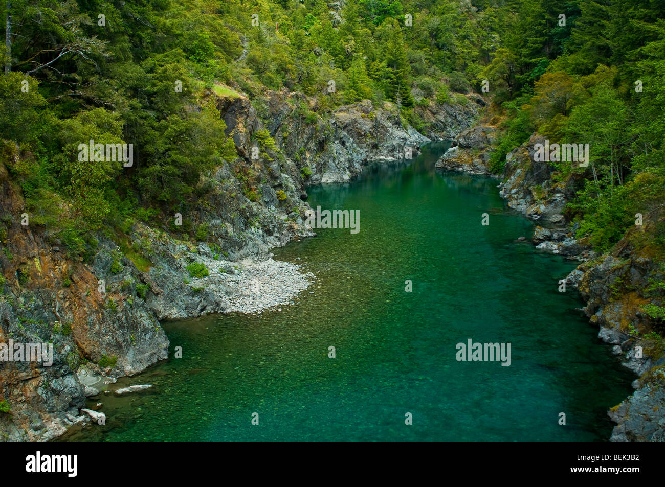 Smith River flowing through forest canyon, Del Norte County, California Stock Photo