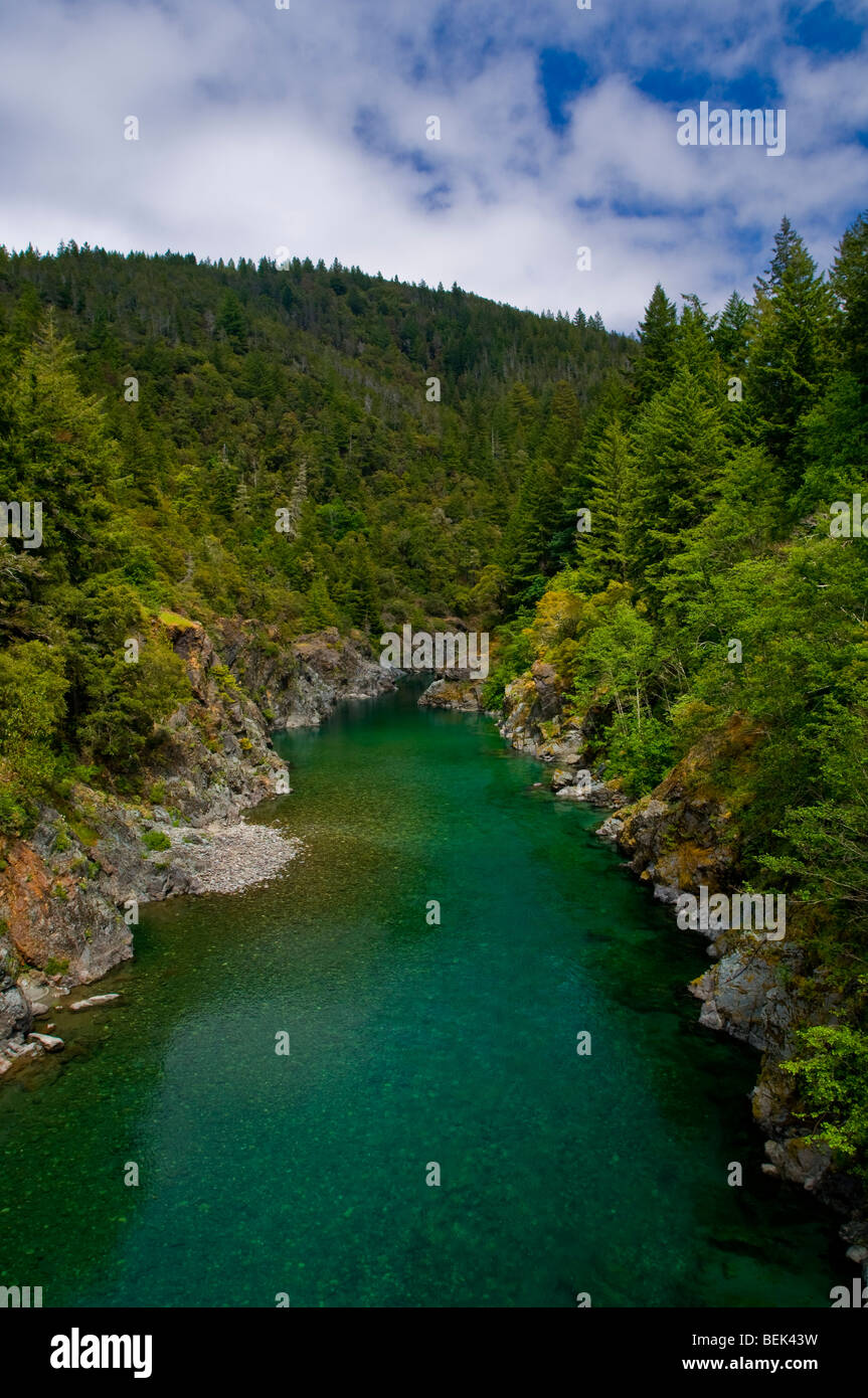 Smith River flowing through forest canyon, Del Norte County, California Stock Photo