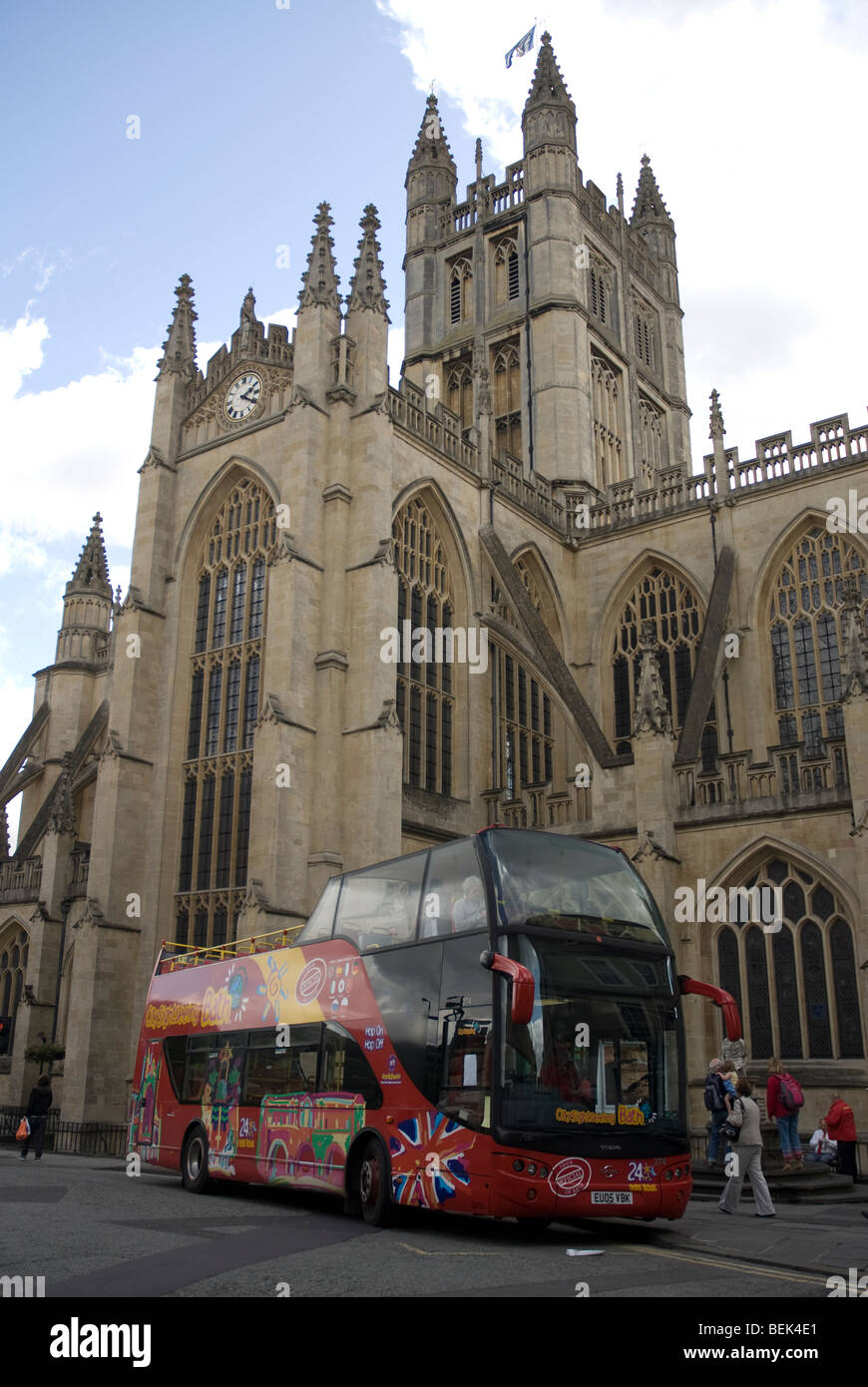 Sightseeing bus of Bath Spa waiting for passengers outside the Abbey