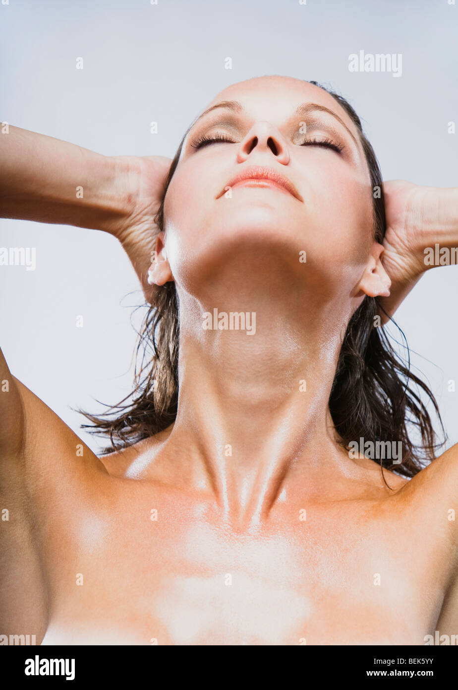 Close-up of a woman with her eyes closed Stock Photo