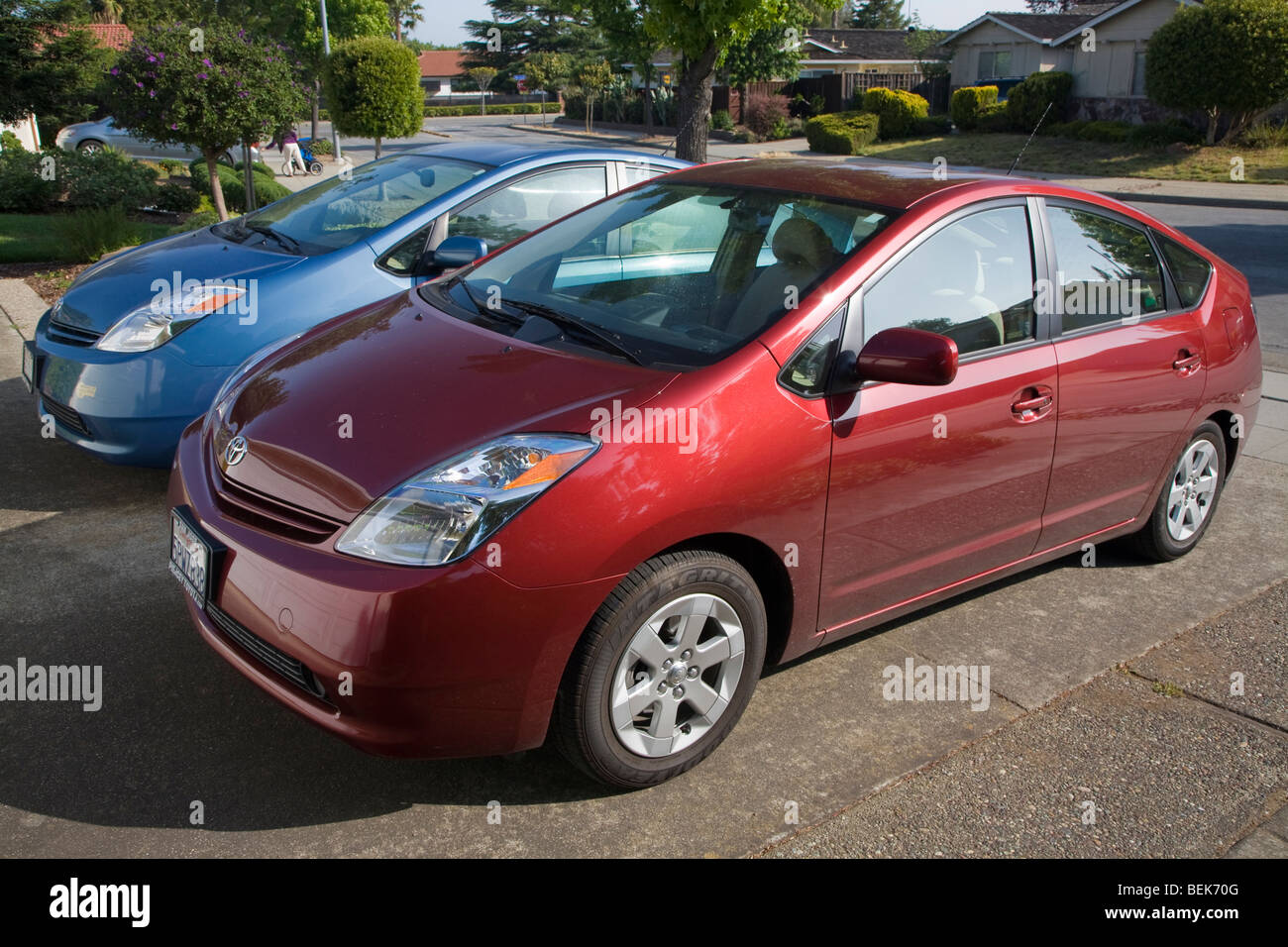 A side view of two parked Toyota Prius hybrid cars. Cupertino, California, USA Stock Photo