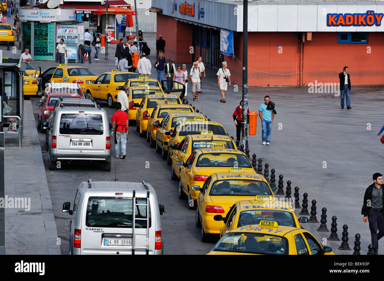 Taxis lined up near the Bosphorus Ferry terminal at Kadikoy Pier near Istanbul's Galata Bridge. Stock Photo