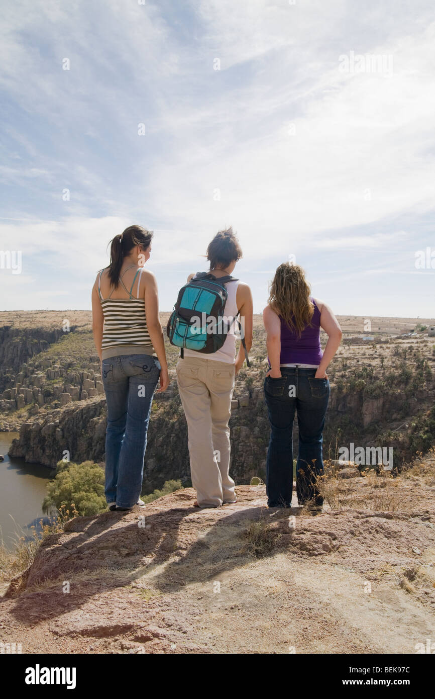 Three women standing on a mountain, San Jose de Gracia, Aguascalientes, Mexico Stock Photo