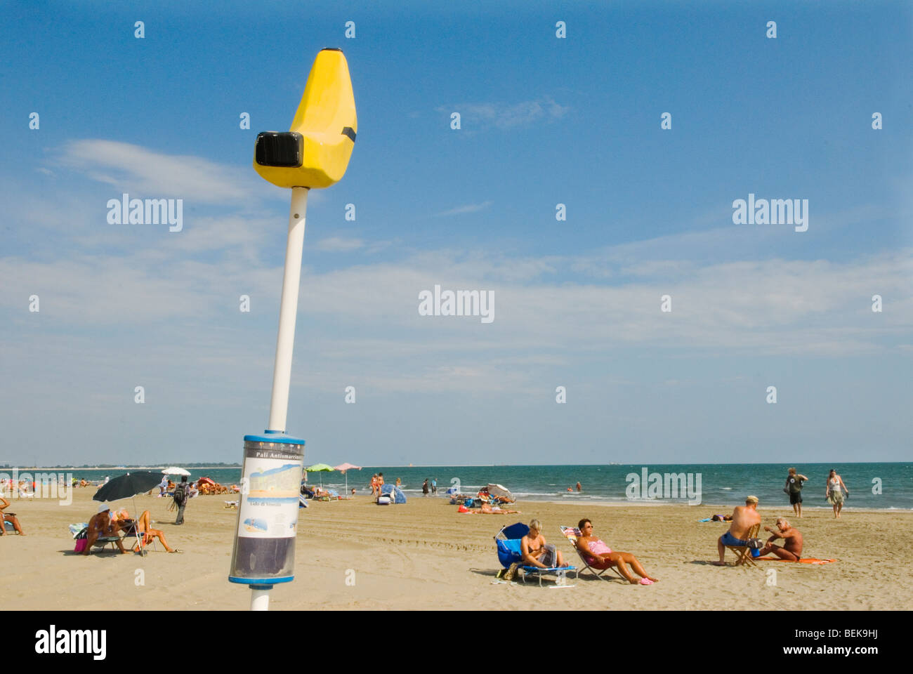 Venice Lido Italy the public beach. Huge banana sign lets people know where they are positioned on the beach 2000s 2009 HOMER SYKES Stock Photo