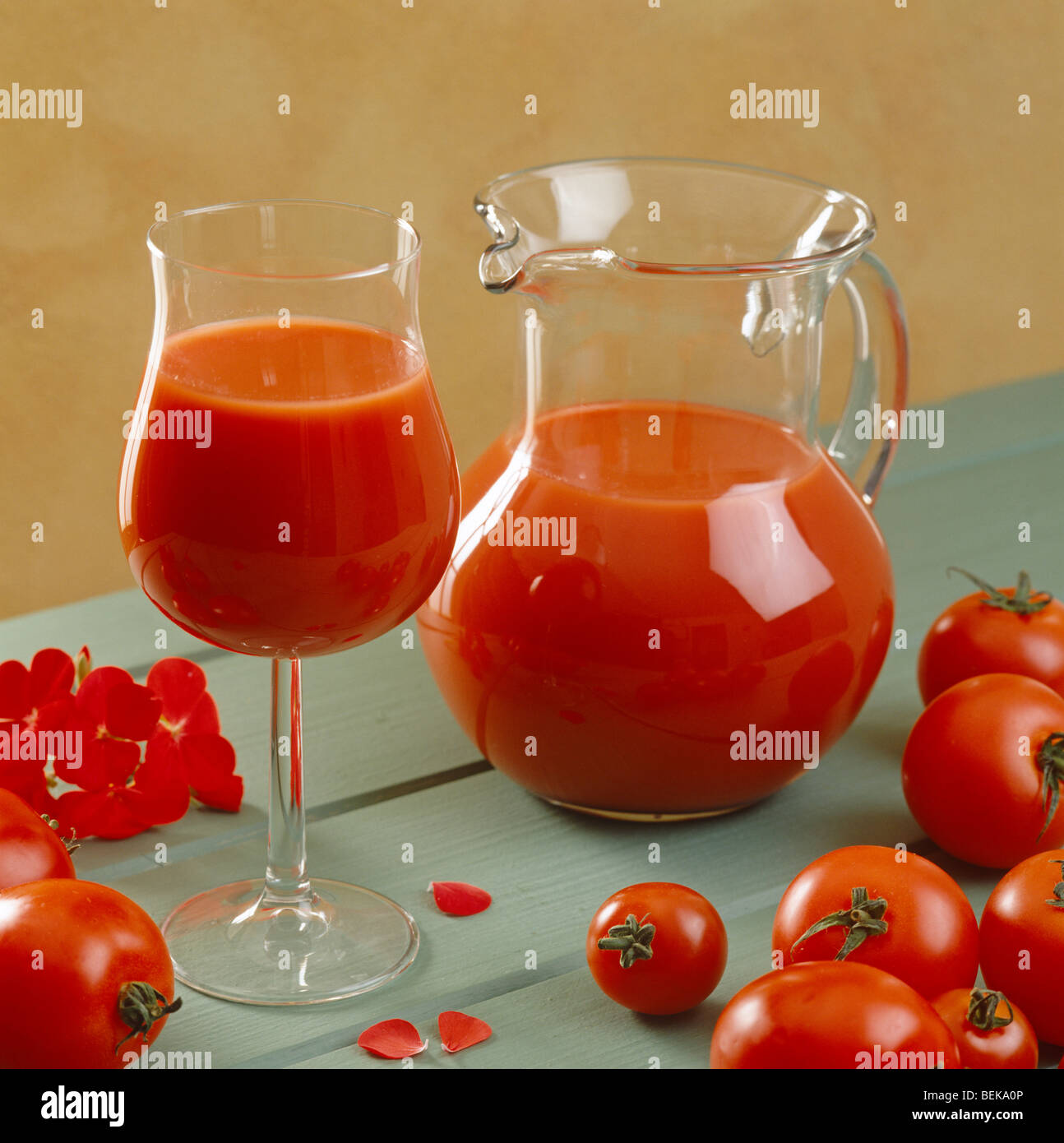 Tomatoes and juice Stock Photo
