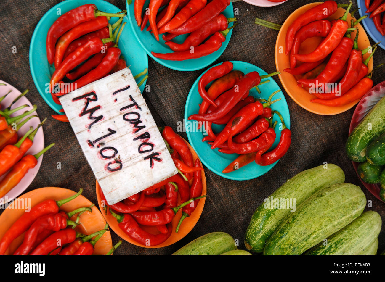 Display of Red Hot Chili Peppers, Capsicum, Cayenne Peppers or Chilli Peppers on a Vegetable Stall or Market Kuching Sarawak Malaysia Borneo Stock Photo