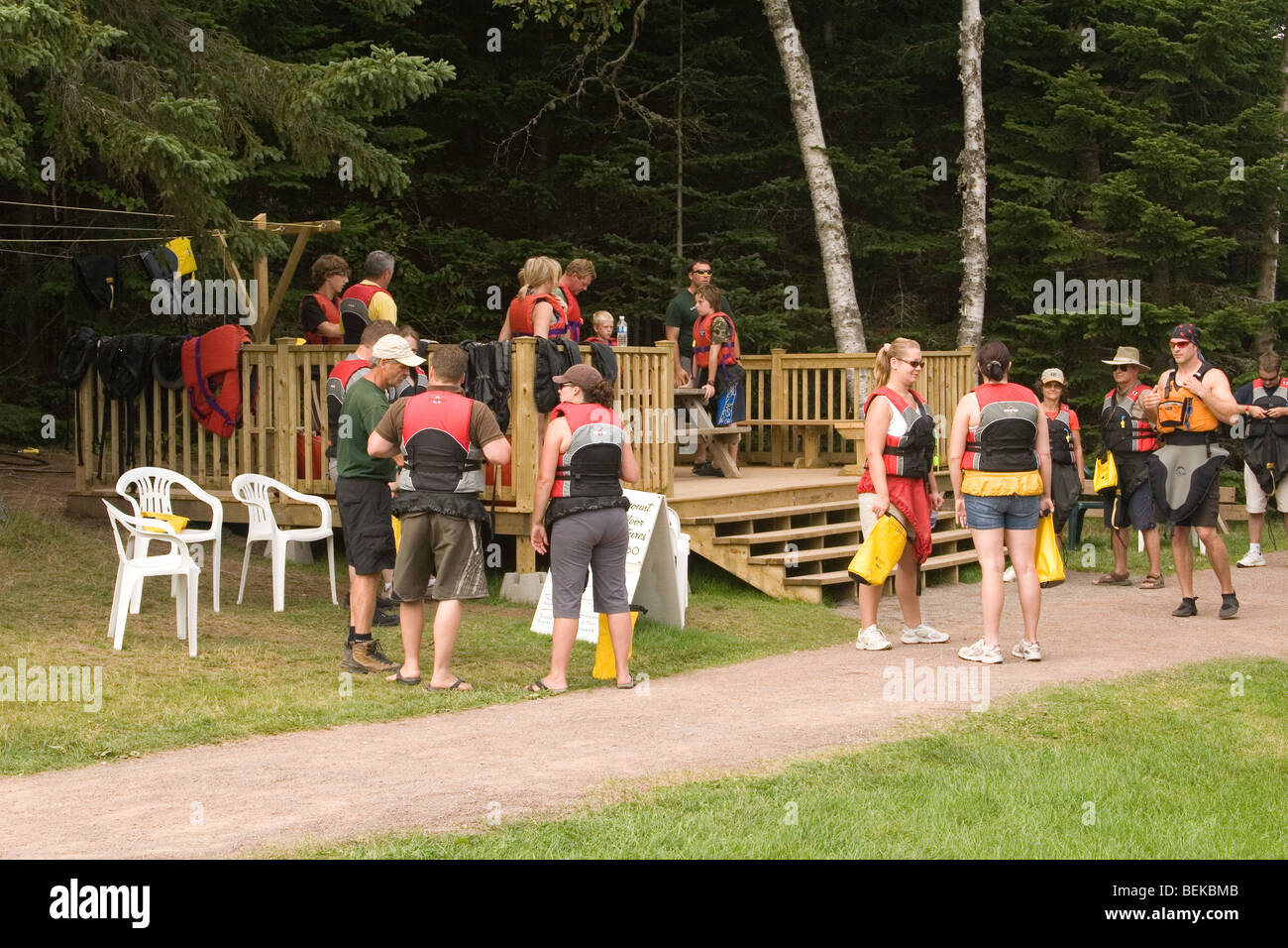 Paddlers gather before being trained to kayak in the Bay of Fundy, Nova Scotia. Stock Photo