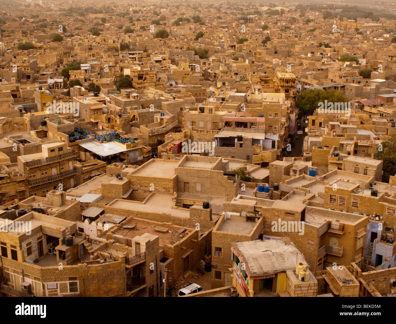 JAISALMER, INDIA: A view from above of the yellow sandstone buildings of Jaisalmer which have lead to it being known as The Gold Stock Photo