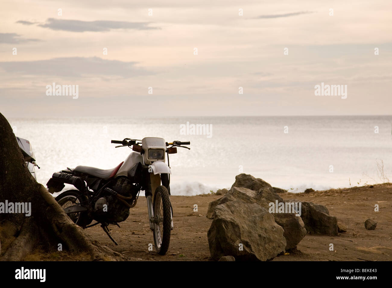 Dirt bike sitting on the beach in Playa del Coco, Guanacaste Province