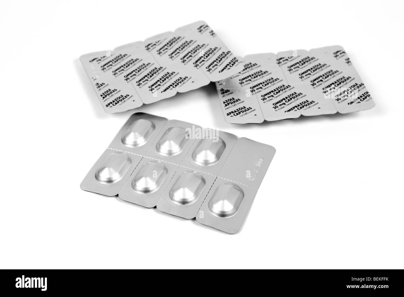 Blister packs of Omeprazole Gastro-Resistant Capsules used to treat Ulcers Stock Photo