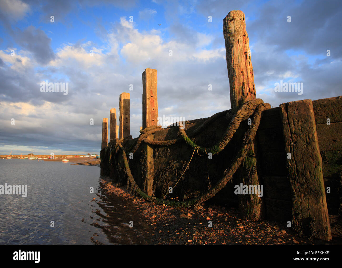 Mooring posts at the harbour of Burnham Overy Staithe on the North Norfolk coast, England, UK. Stock Photo
