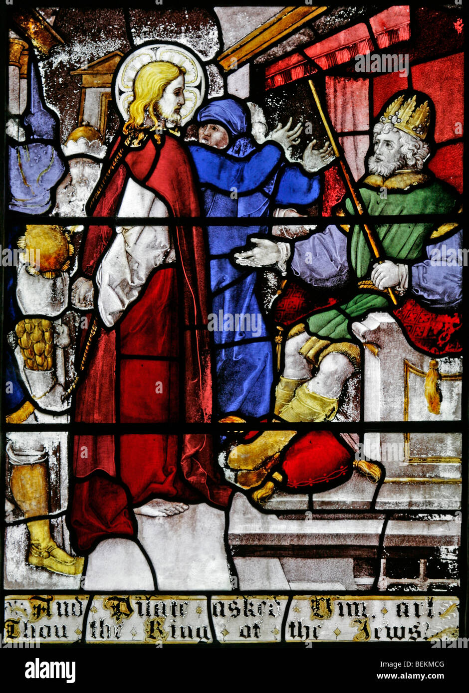 A detail from the stained glass east window at all Saints Church, Shipdham, Norfolk depicting Jesus Christ before Pontius Pilate Stock Photo