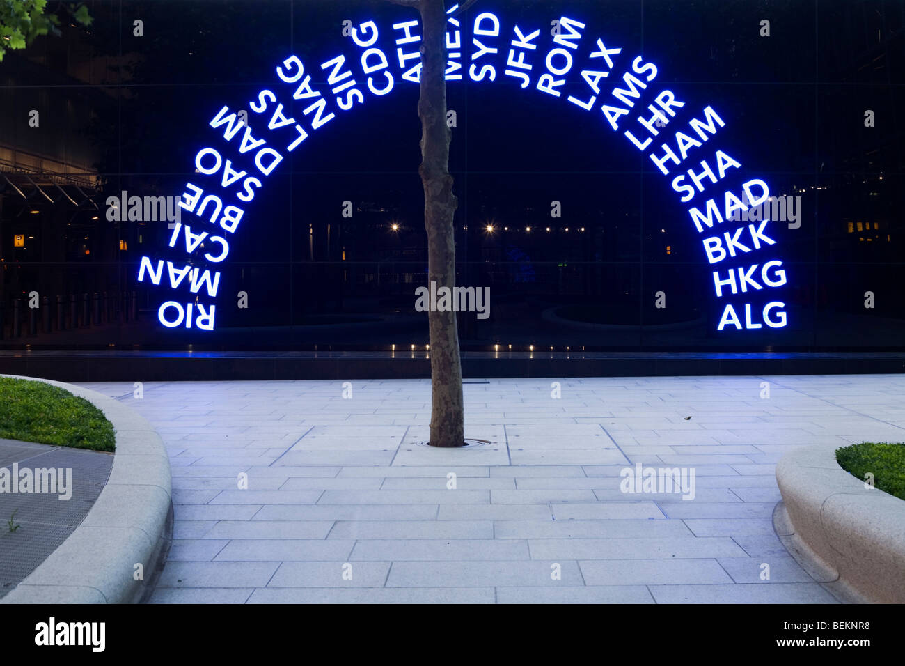 Three letter IATA codes for some of the world's airport destinations used as part of  art design in a plaza outside Heathrow T5 Stock Photo