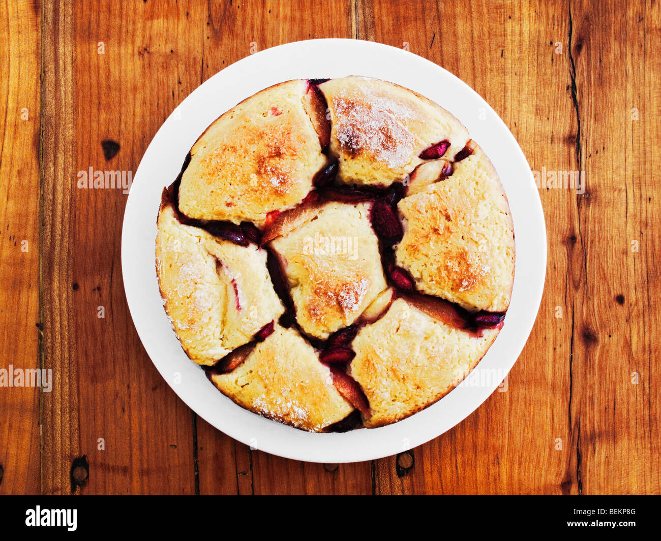 Austrian Bread Dumpling With Fruit On Rustic Wooden Table Stock Photo