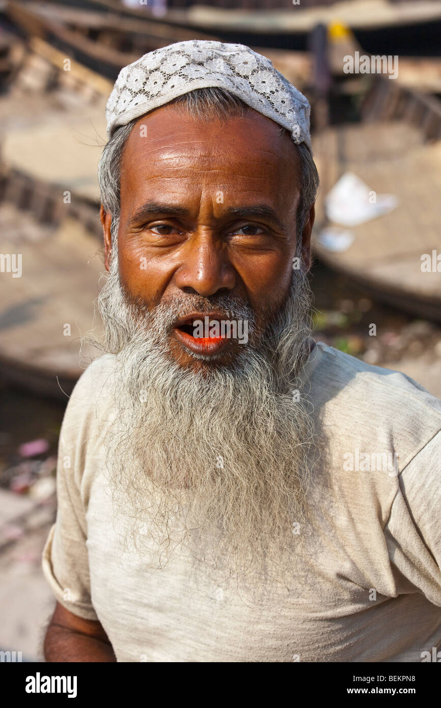 Muslim man chewing betel nut in Old Dhaka Bangladesh Stock Photo