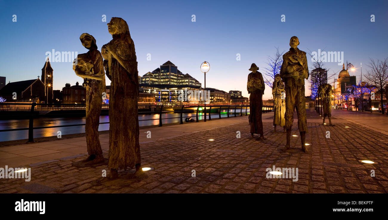 Panoramic image of the Irish Famine Memorial by sculptor Rowan Gillespie in Dublin, Ireland at night Stock Photo