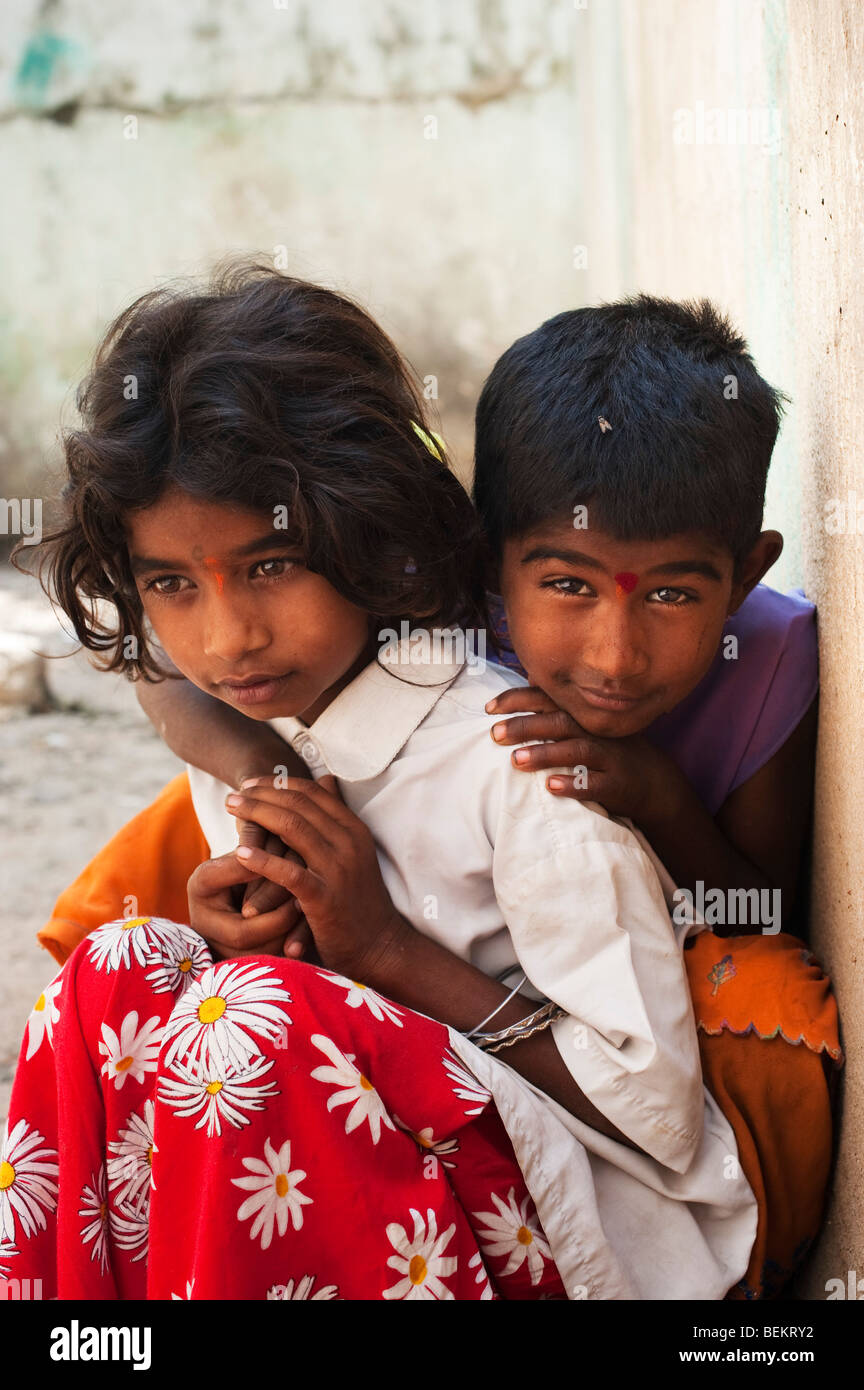 Poor young Indian street girls smiling Stock Photo