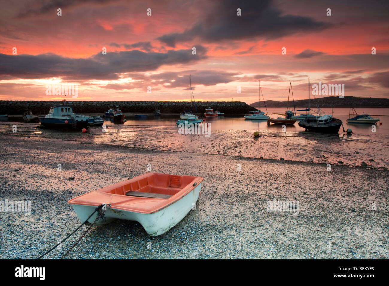 Early morning in Rhos harbour with the boats waiting for the tide in Rhos on Sea, Colwyn Bay, Wales, UK Stock Photo