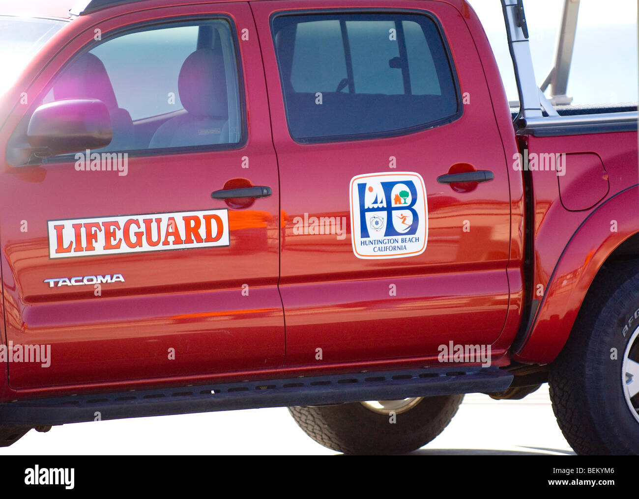Huntington Beach Lifeguard.  A close-up view of the Huntington Beach Lifeguard red truck (Toyota Tacoma). Stock Photo