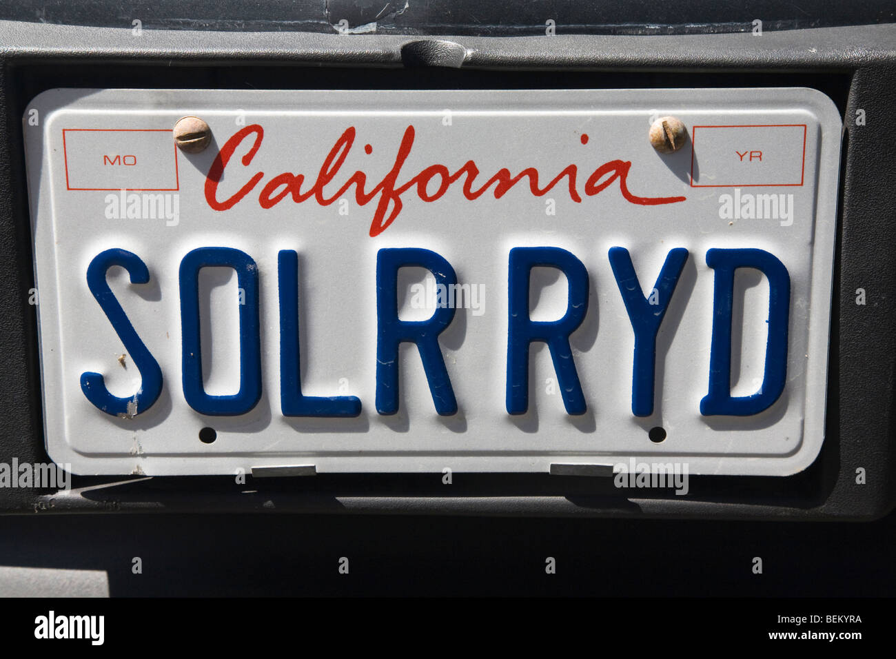 Close up of 'SOLR RYD' license plate promoting electric vehicles ...