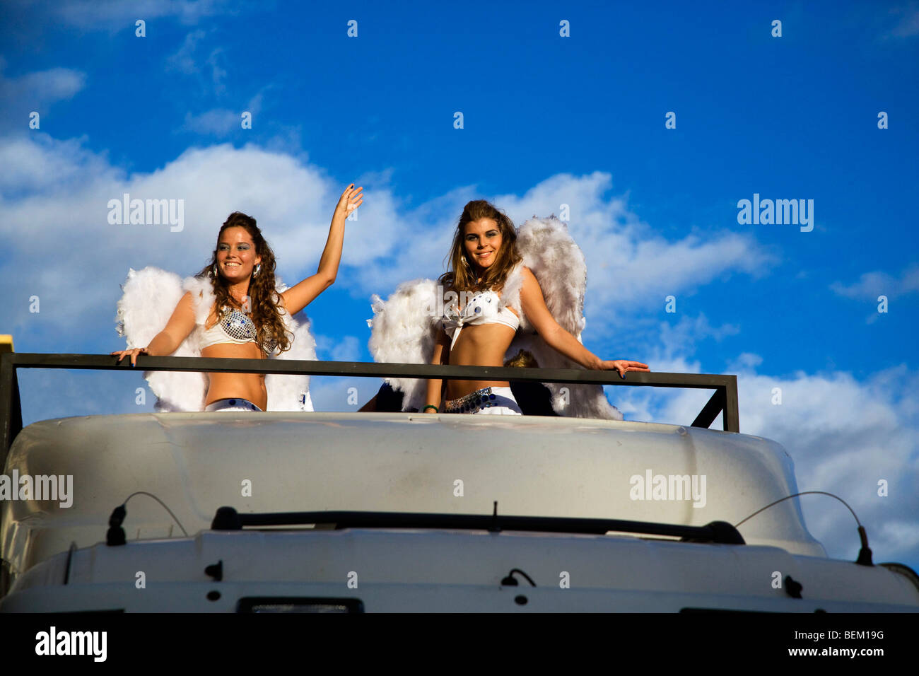 Two young spanish girls wearing angels wings at the Las Palmas carnival, Gran Canaria, Canary Islands, Spain, Europe Stock Photo