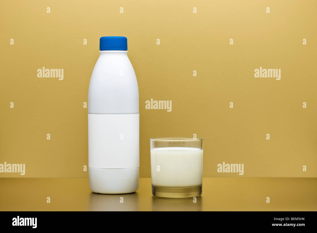 Glass and bottle of milk Stock Photo