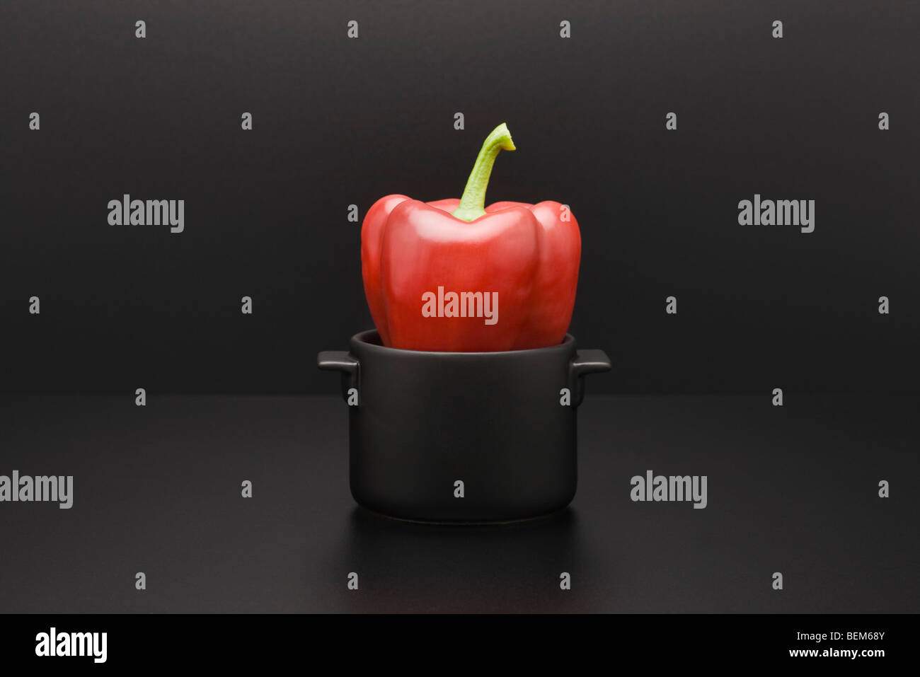 Red bell pepper in miniature pot Stock Photo Alamy