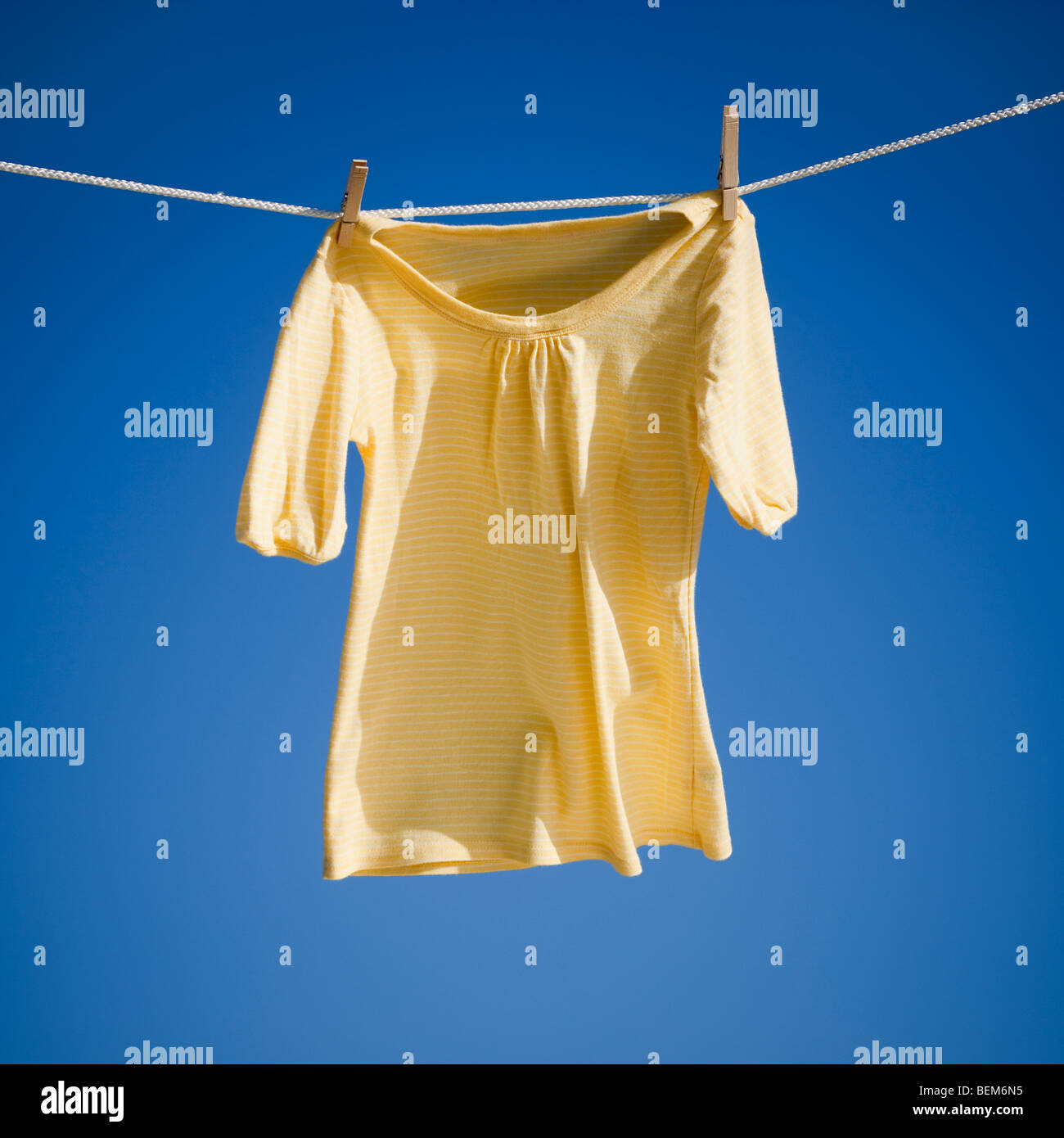Blouse on clothes line Stock Photo - Alamy