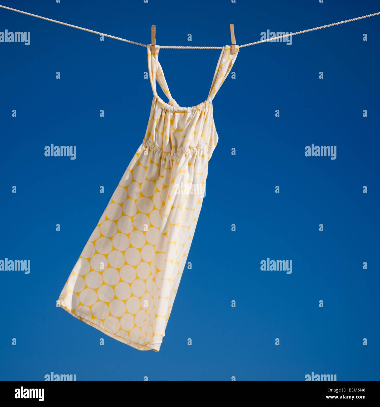 Dress on clothes line Stock Photo