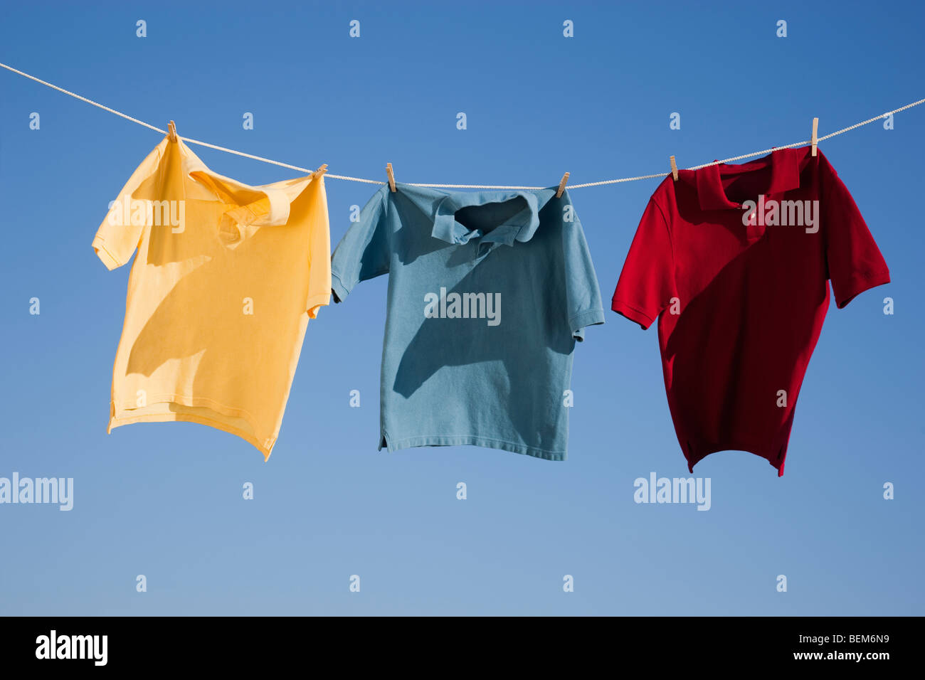 Shirts on clothes line Stock Photo Alamy