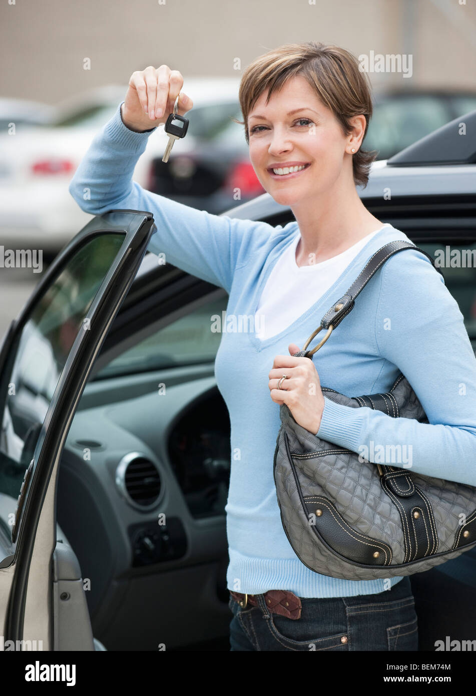 Woman shopping for car Stock Photo