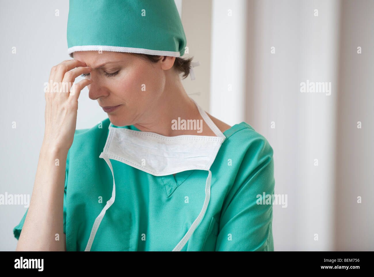 Female doctor in thought Stock Photo